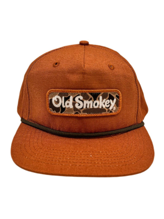 Brown cap with 'Old Smokey' camo logo on a white background