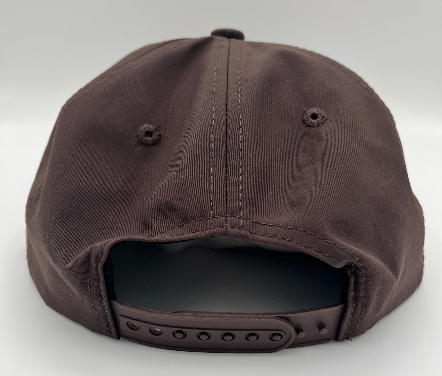 Brown cap on a white background
