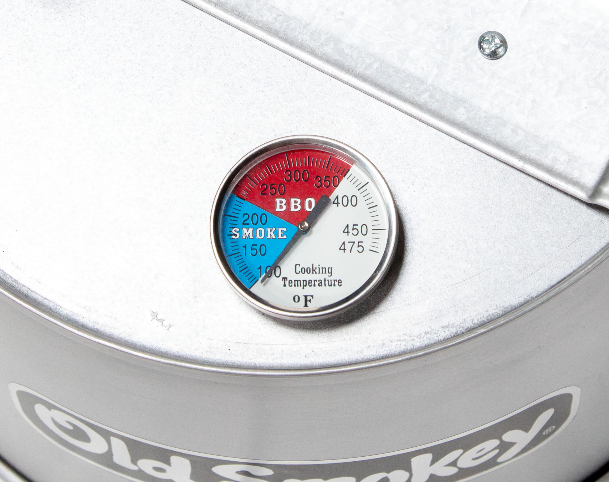 Temperature gauge on a smoker with 'Old Smokey' branding