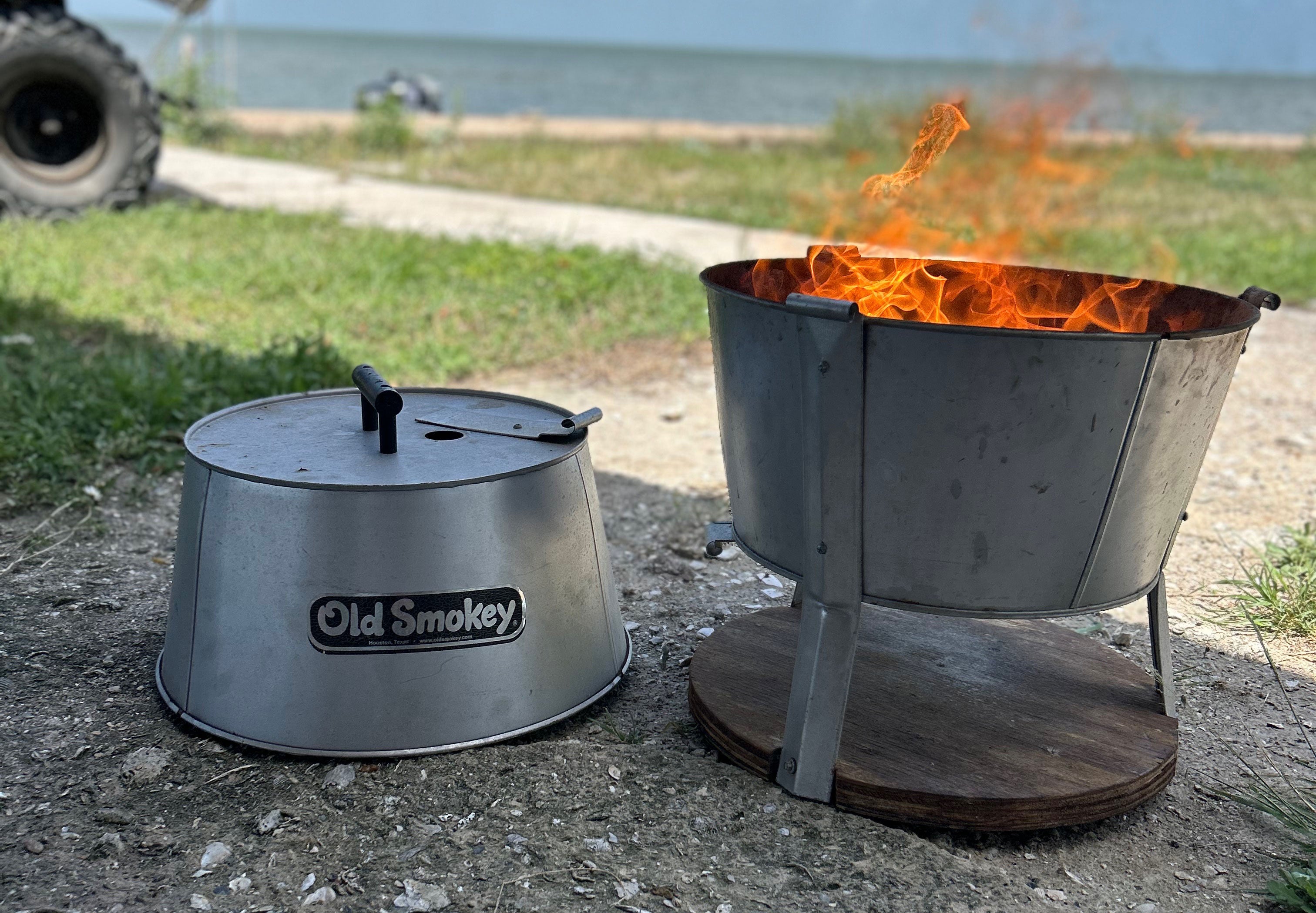 Flames coming out of an Old Smokey Charcoal Grill