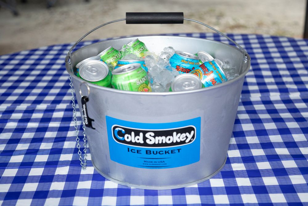 Steel bucket with bottle opener attached. Sealed and ready to keep drinks cold