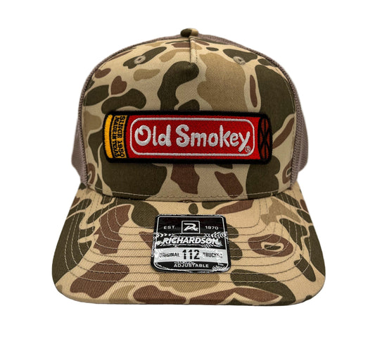 Camouflage trucker hat with Old Smokey logo patch